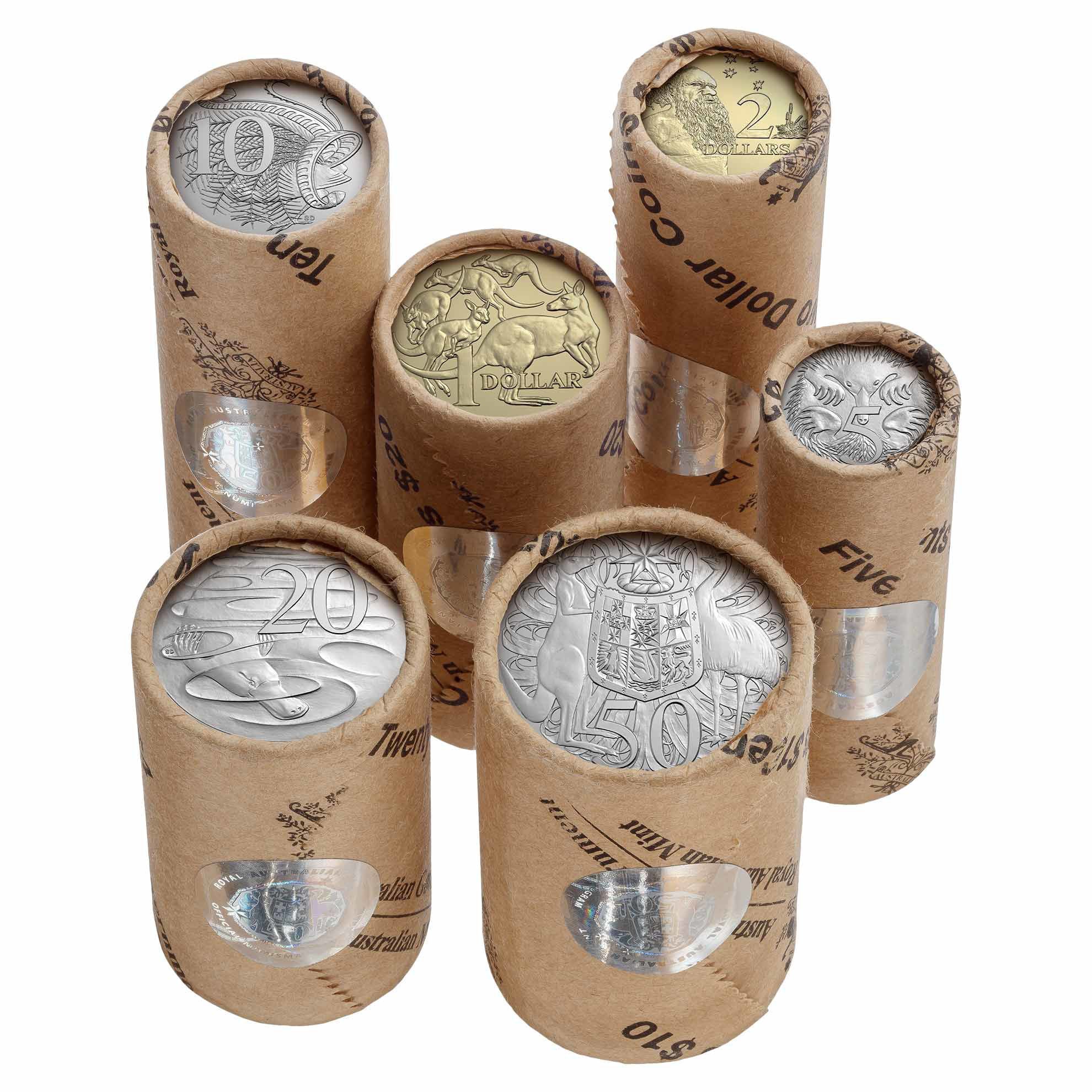 a group of six rolls of silver coins
