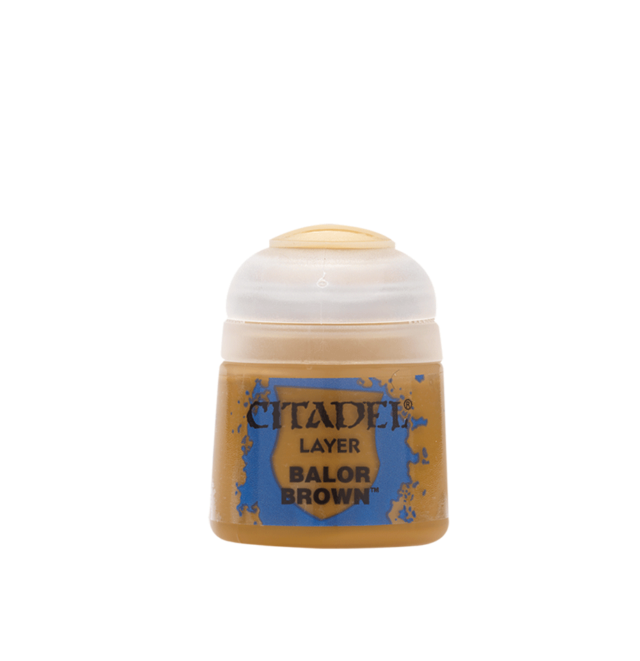 a bottle of brown colored paint on a white background