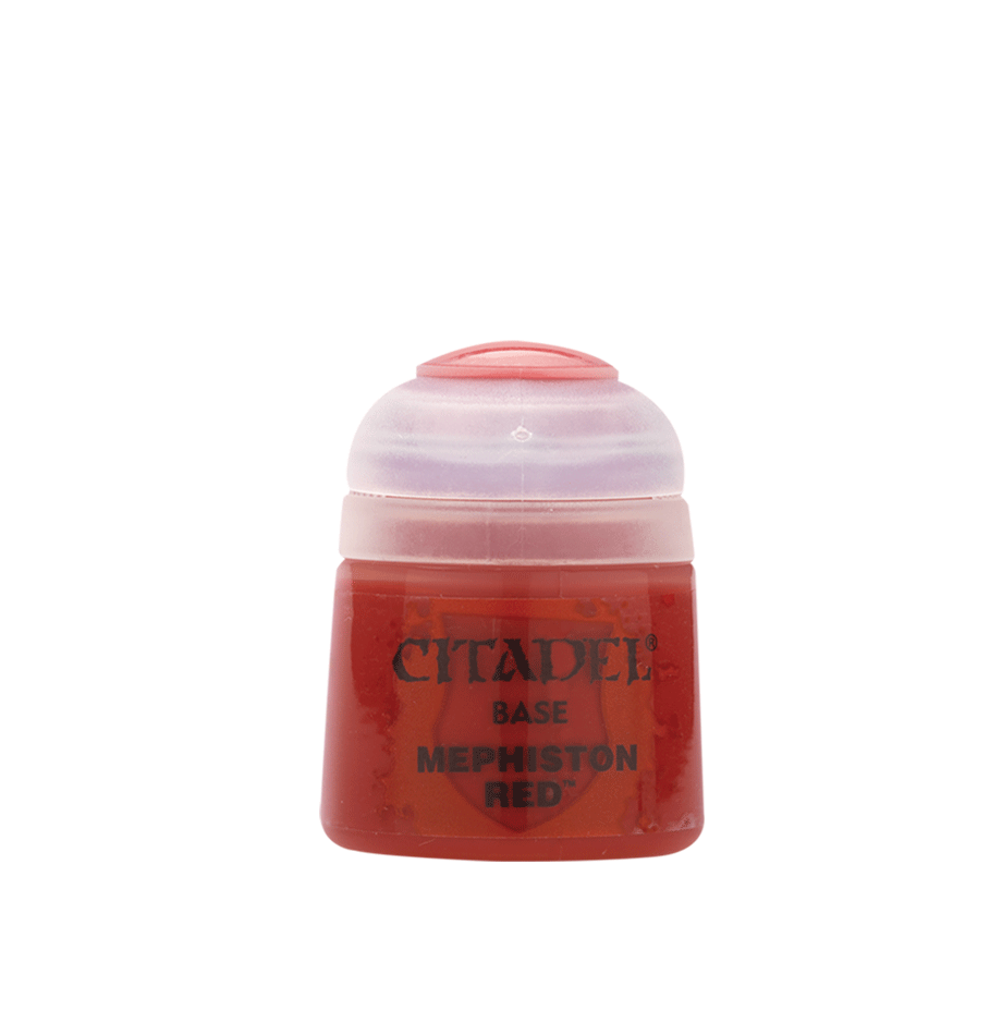 a close up of a bottle of red paint