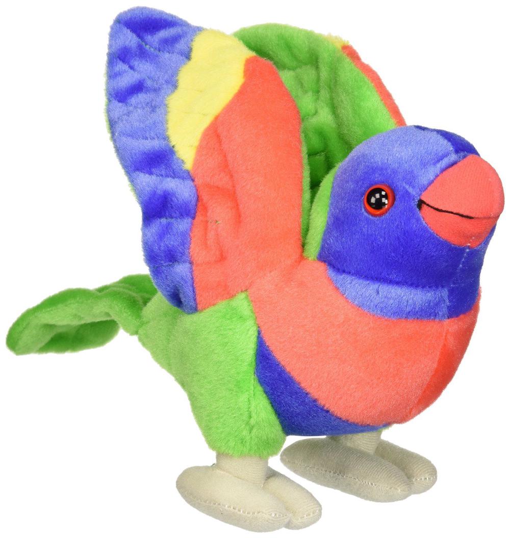 a colorful stuffed bird sitting on top of a white surface