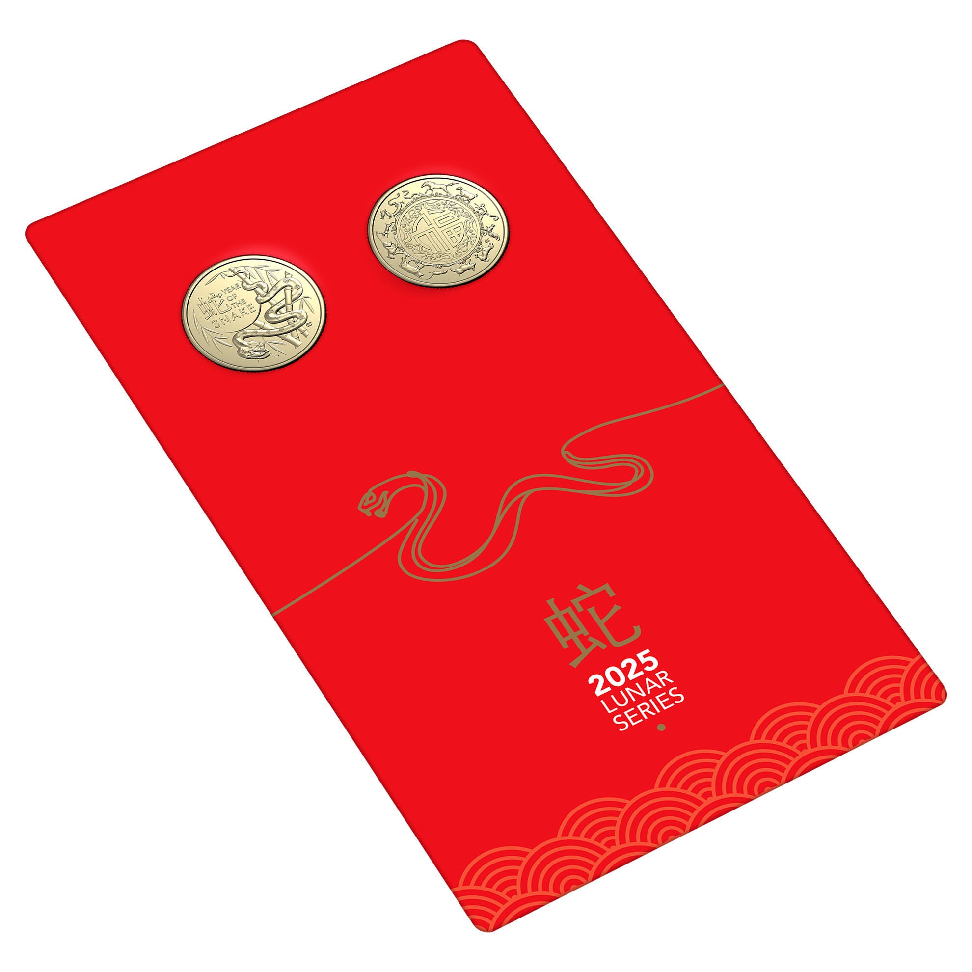 a red book with two coins on top of it