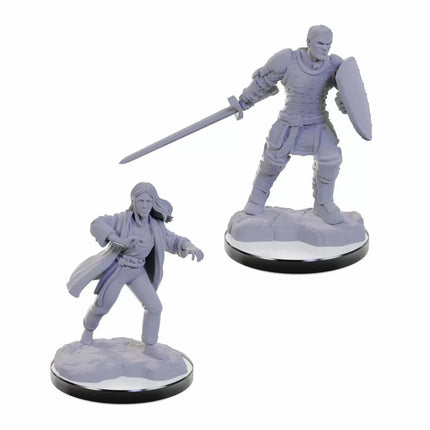 a couple of figurines that are on a table