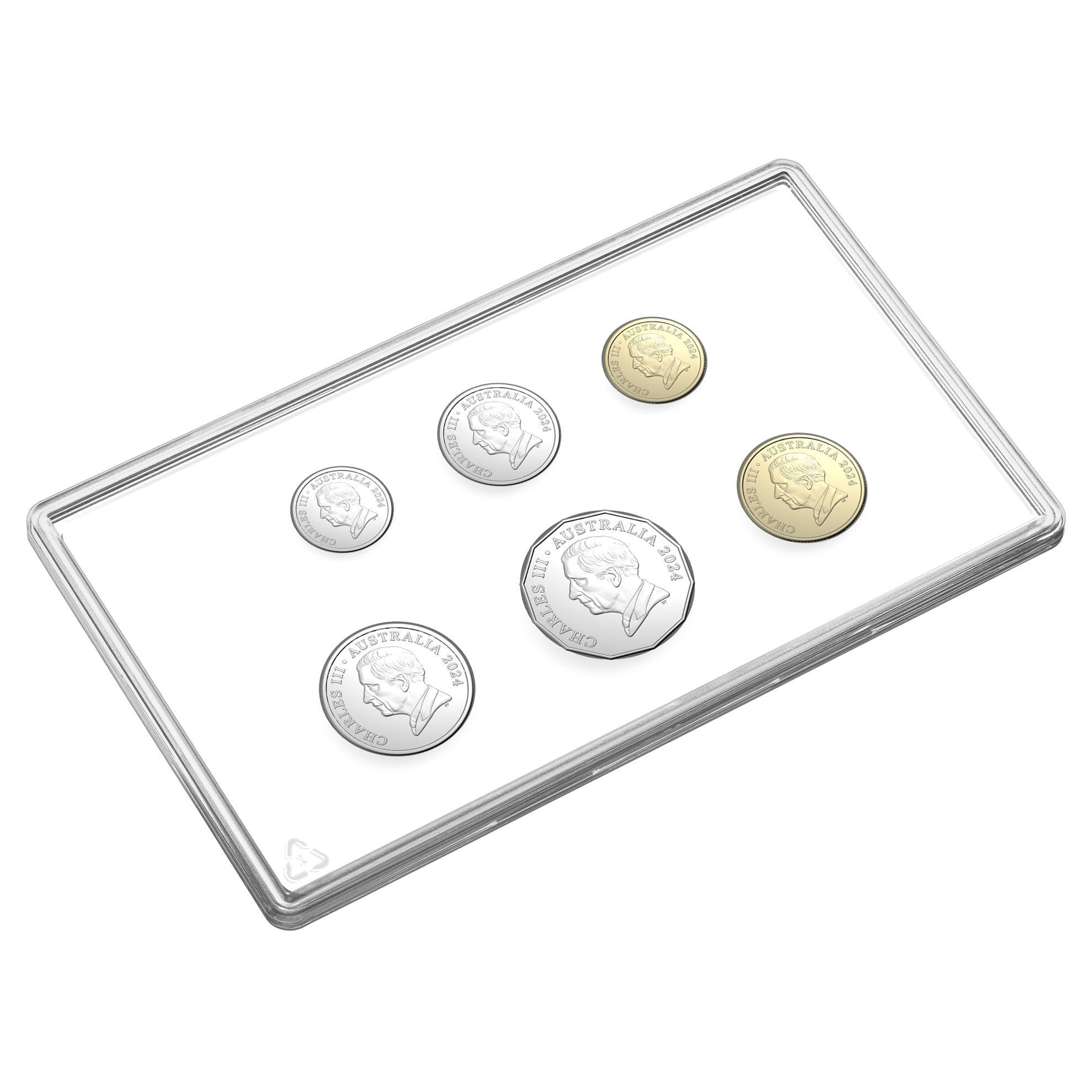 a metal tray with four coins on it