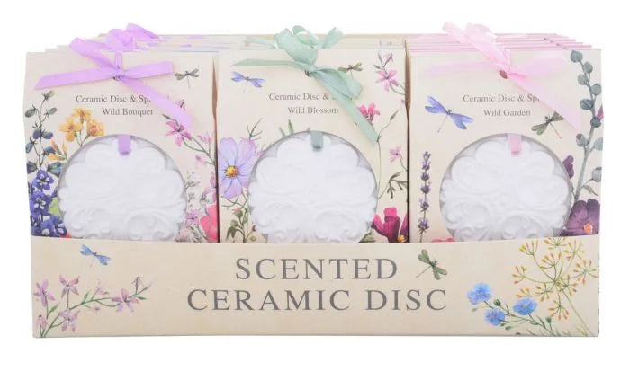 a box of three soaps with flowers on them