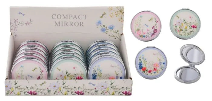 a set of six compact mirrors in a box