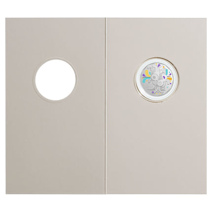 a white door with a circular window in the center