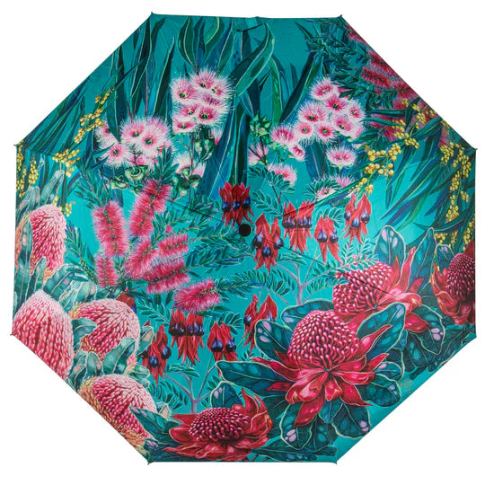 an umbrella with a floral pattern on it