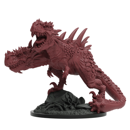 a red plastic dragon figurine on a black base