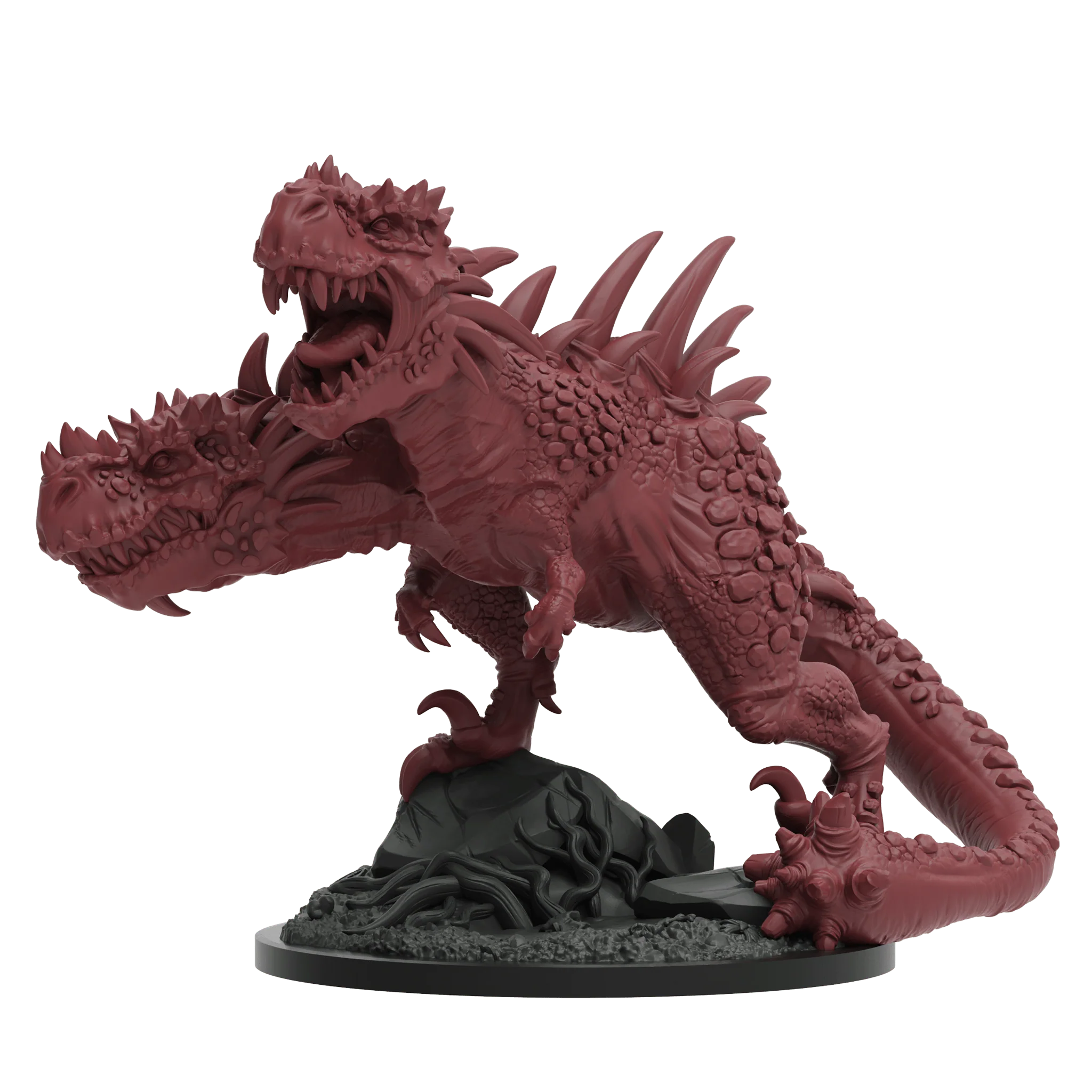 a red plastic dragon figurine on a black base
