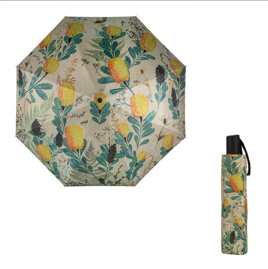 an umbrella with a floral pattern and a black handle