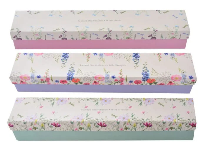 three boxes with floral designs on them