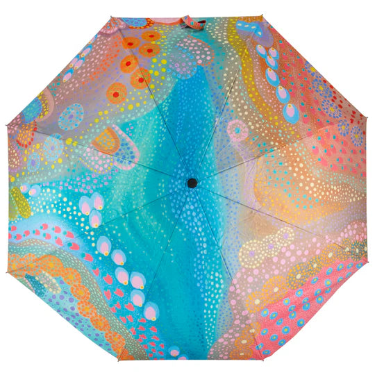 an umbrella with a colorful design on it
