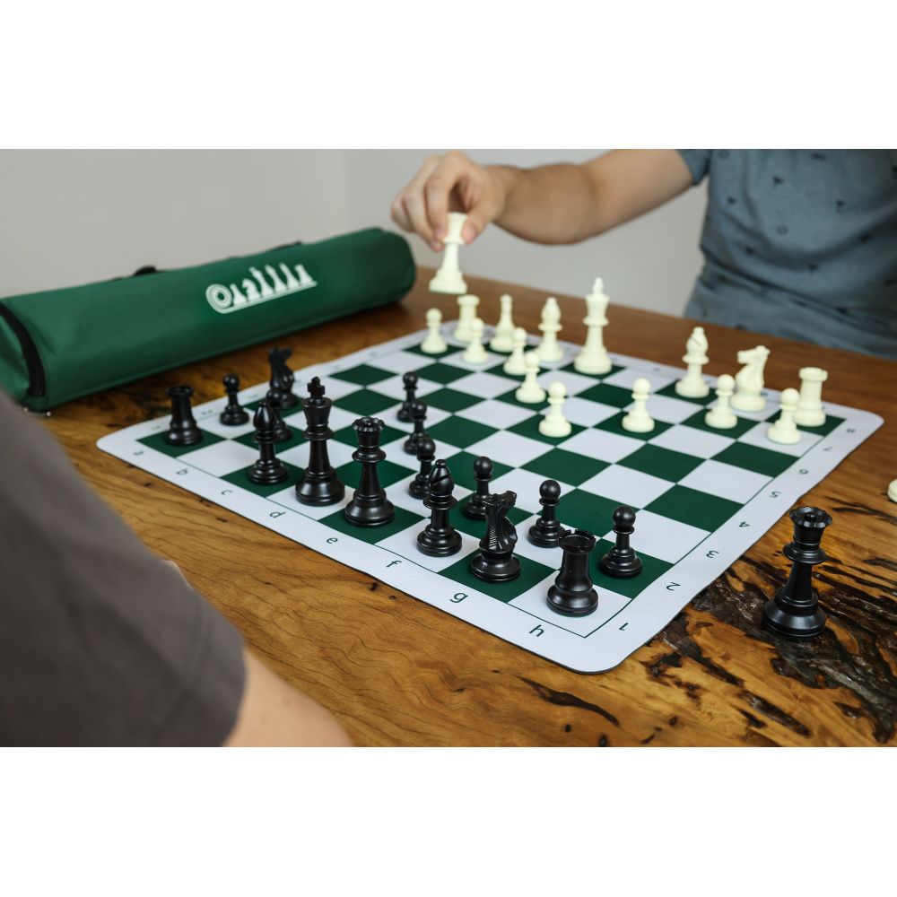 a man playing a game of chess on a table