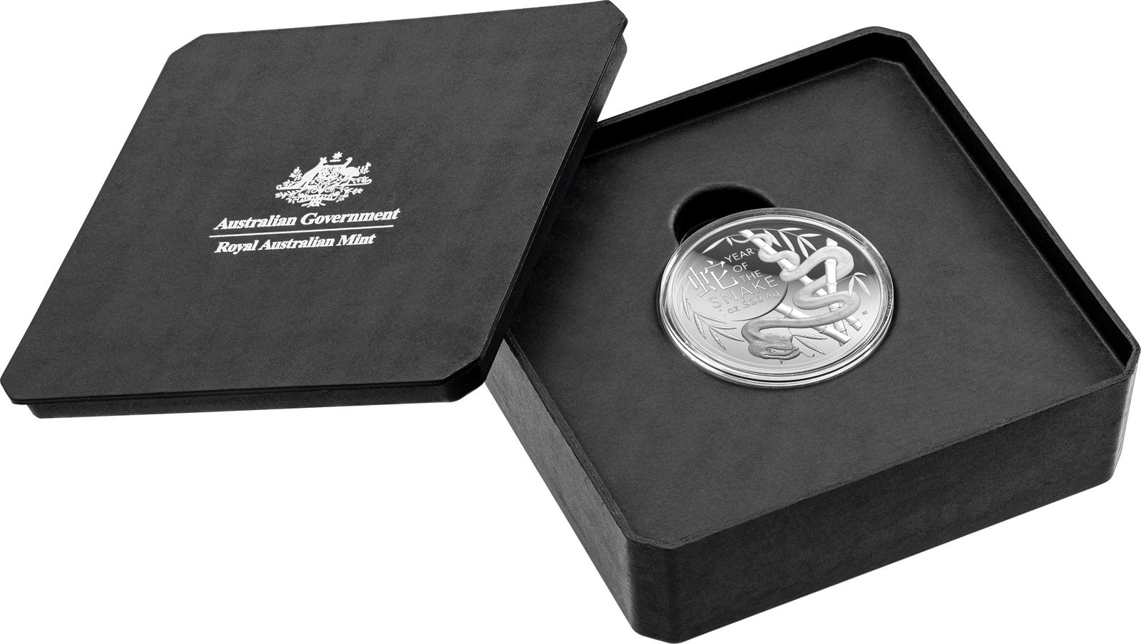 a black box with a silver coin in it