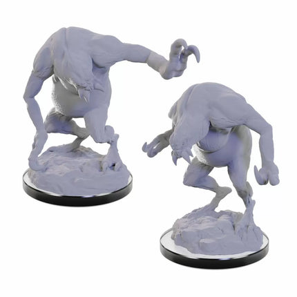 a couple of figurines that are on a table