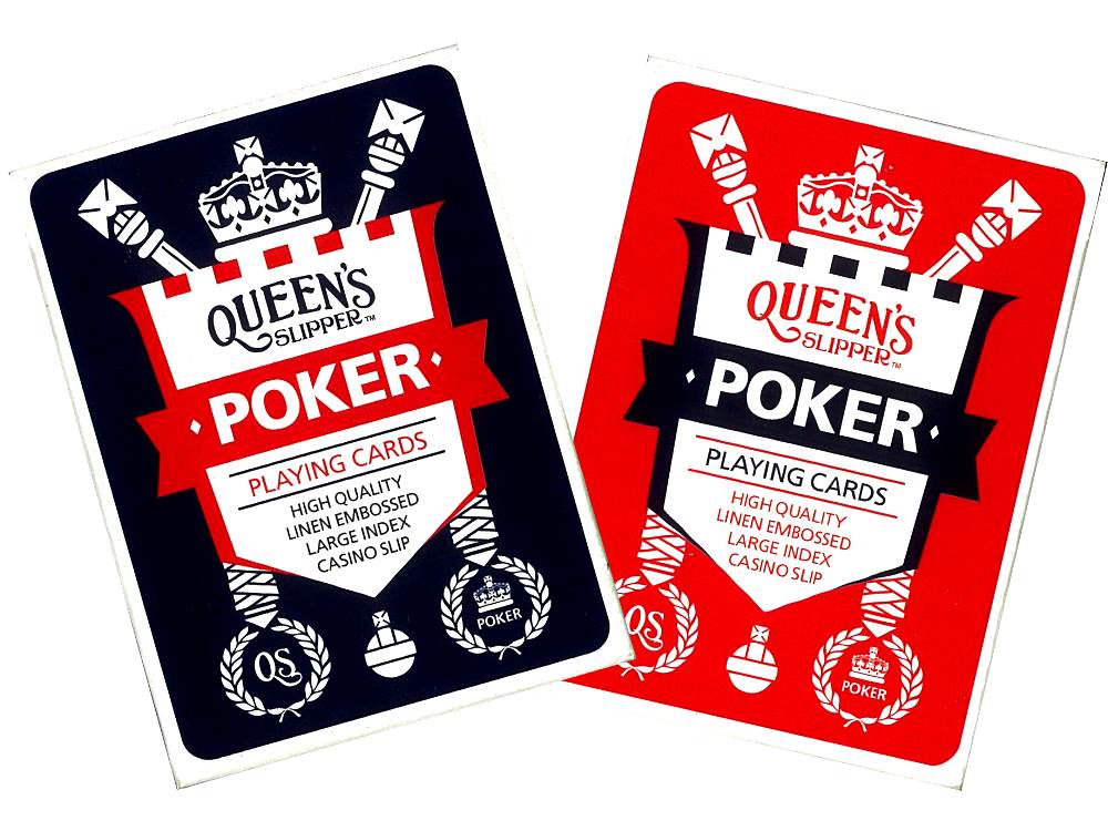 a pair of playing cards with a crown on top of it