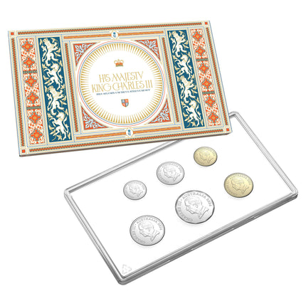 a set of five coins in a box