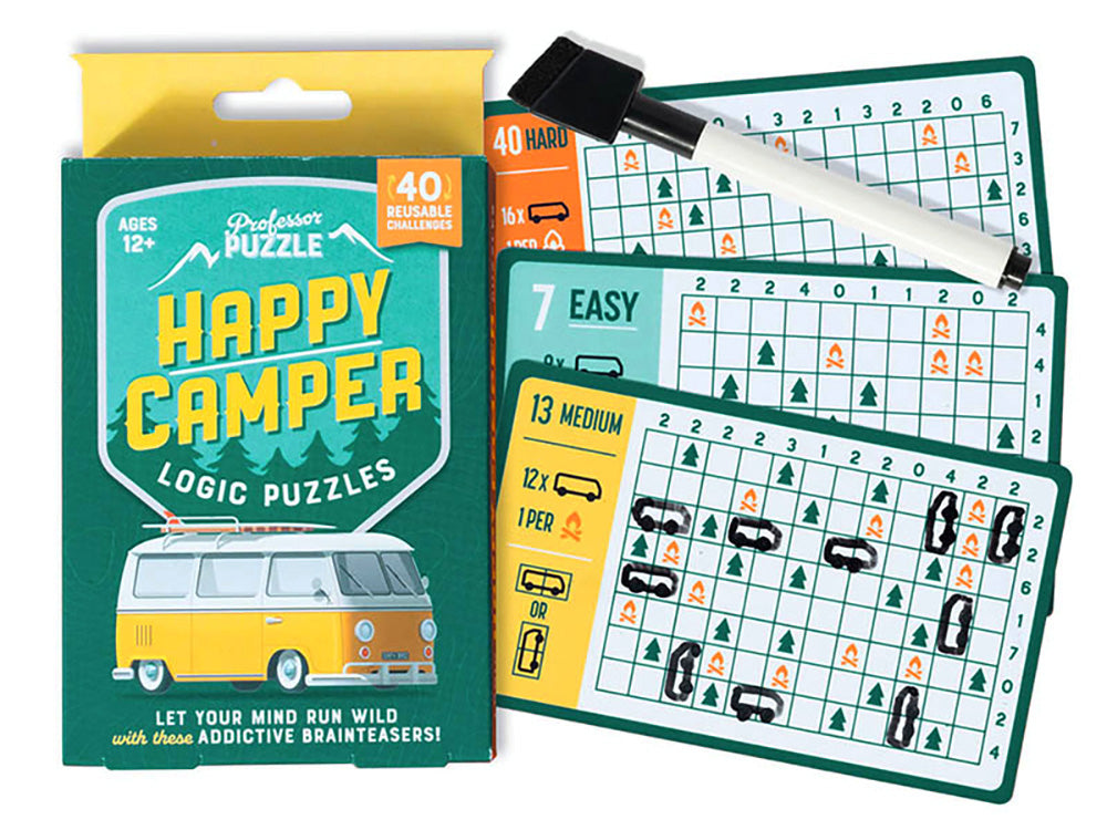a box of happy camper puzzles with a pen