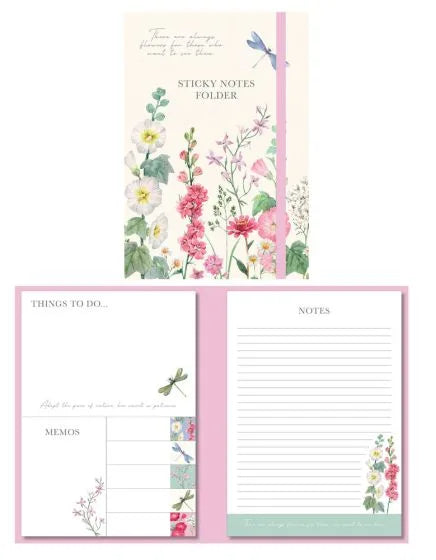 a notepad with flowers and a dragon on it