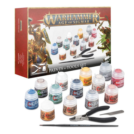 a box of paint and a pair of scissors