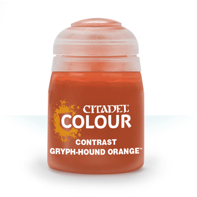 a close up of a bottle of orange paint