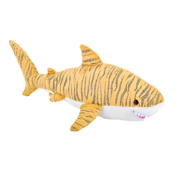 a stuffed tiger shark with a smile on its face