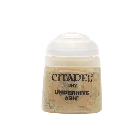 a bottle of paint with a white lid