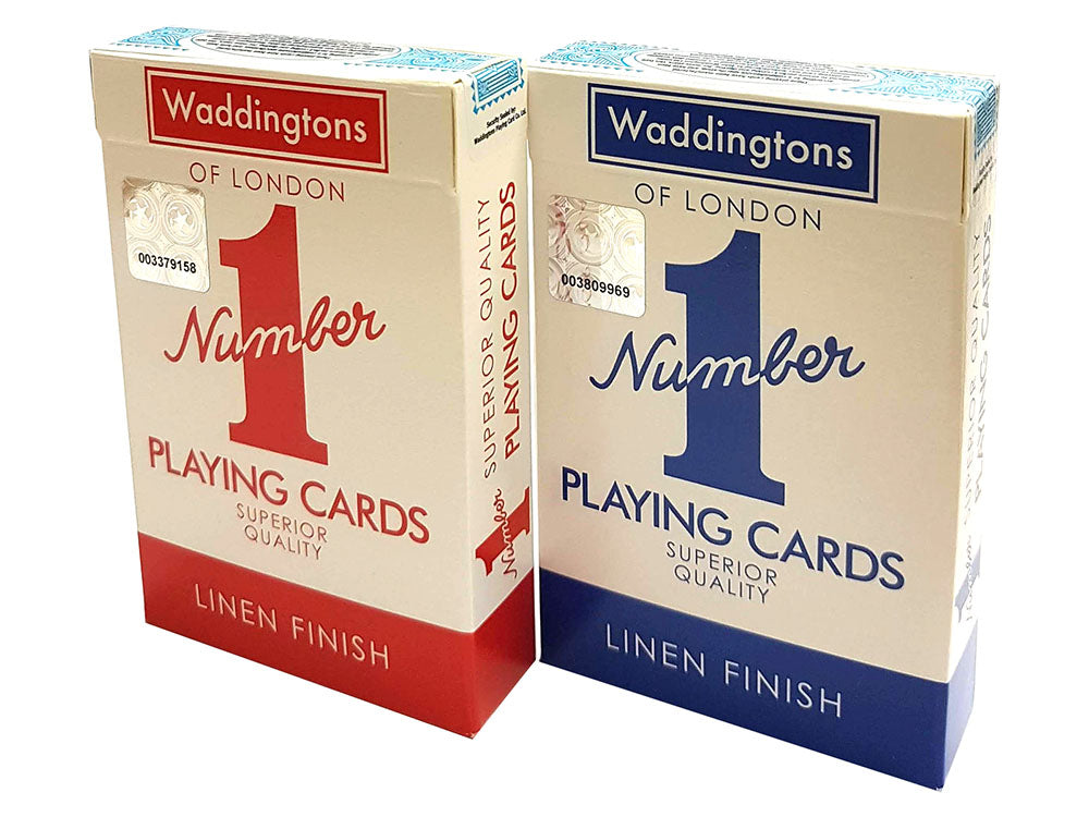 two boxes of playing cards with numbers on them