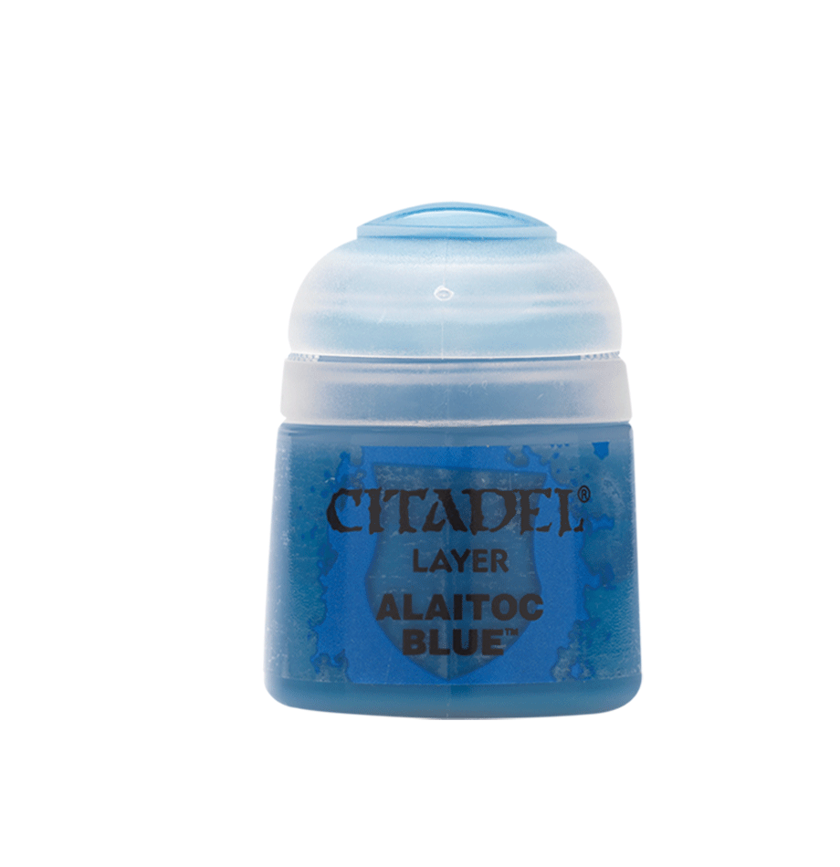 a close up of a bottle of blue liquid