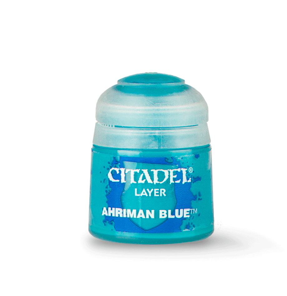 a close up of a bottle of blue ink