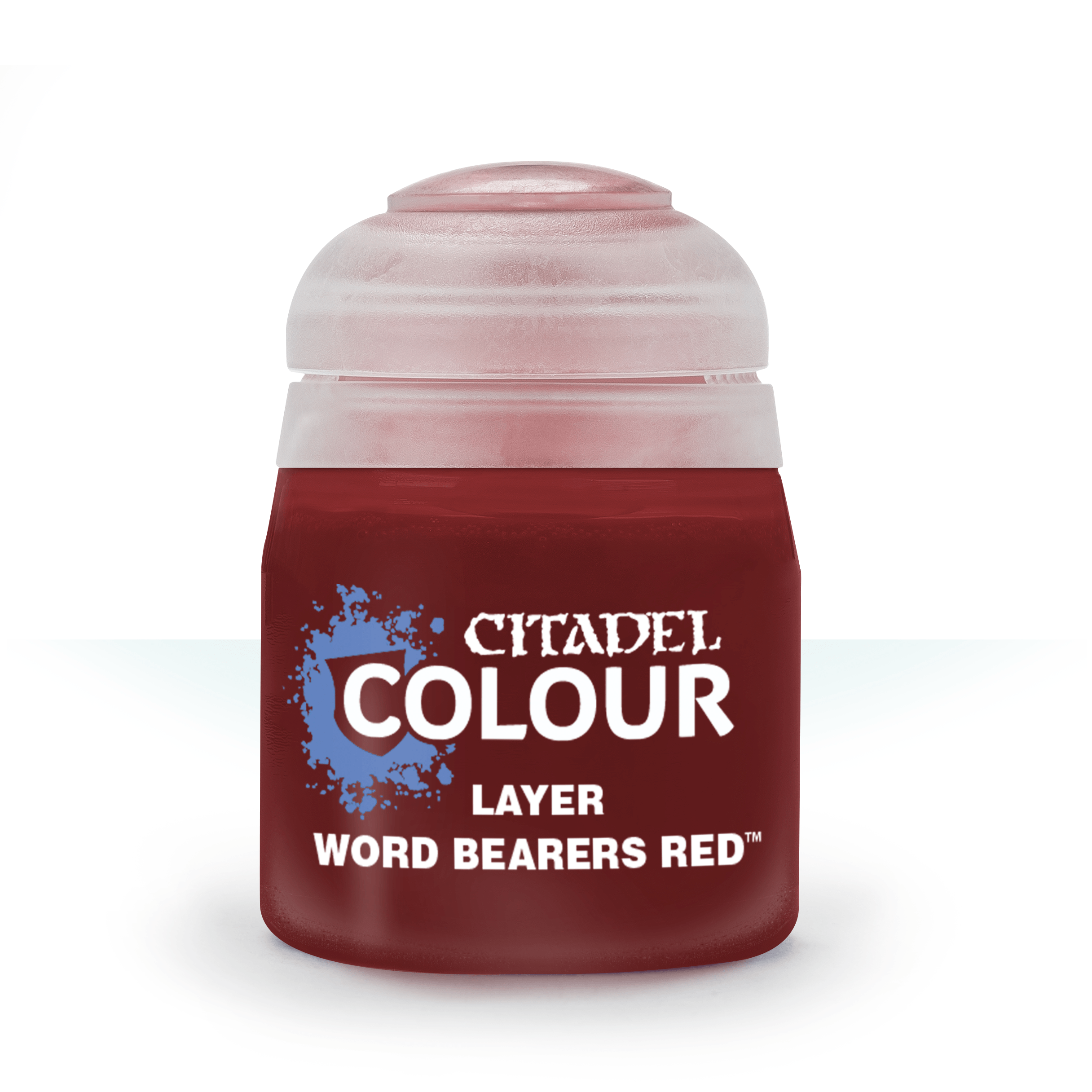 a close up of a bottle of red paint