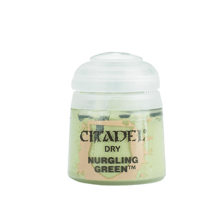 a bottle of green stuff with a white lid