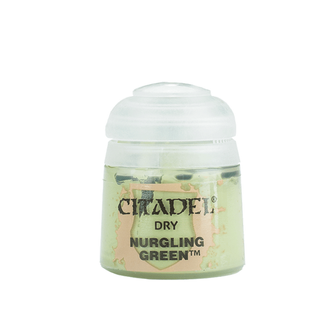 a bottle of green stuff with a white lid