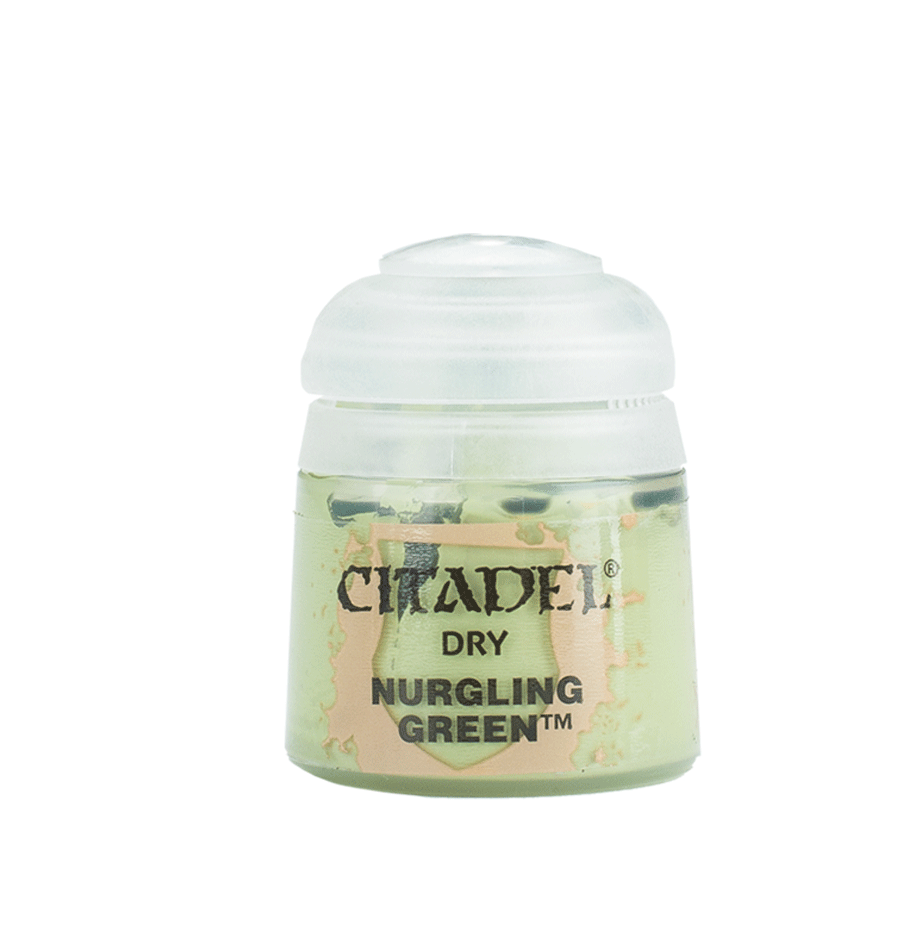 a bottle of green stuff with a white lid
