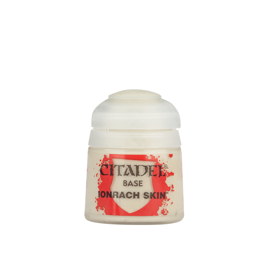 a white bottle with a red and white label on it