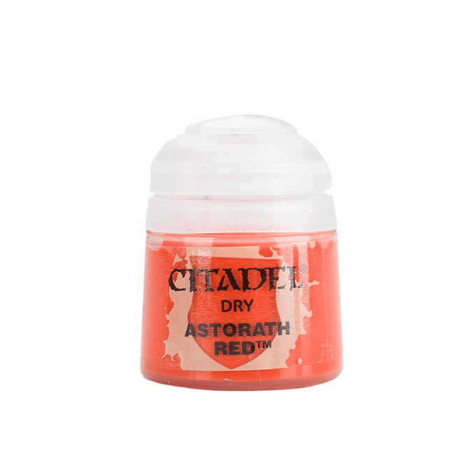a bottle of red paint on a white background