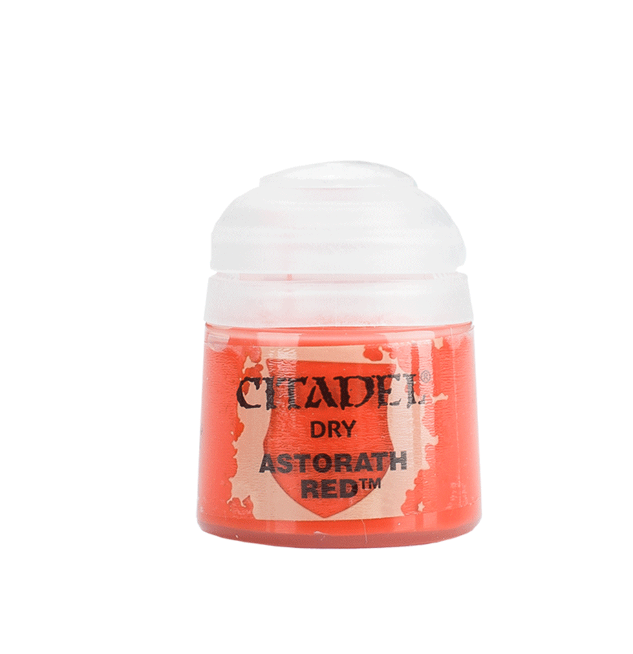 a bottle of red paint on a white background