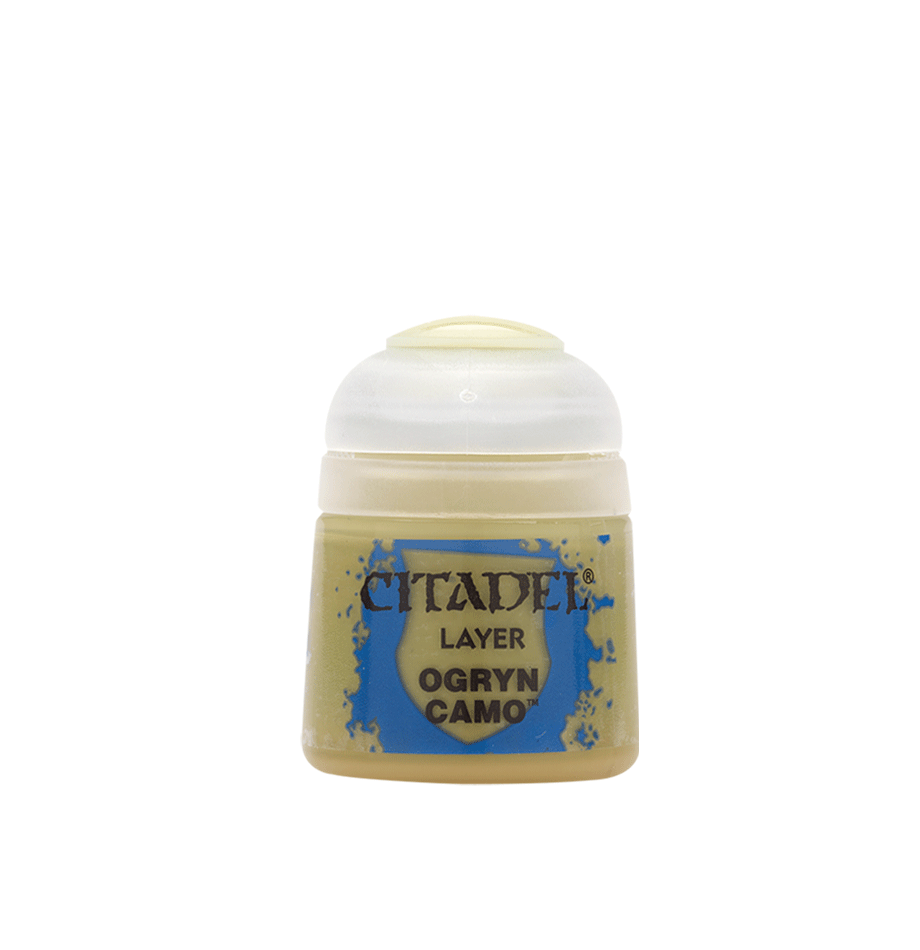 a small jar of clay with a white lid
