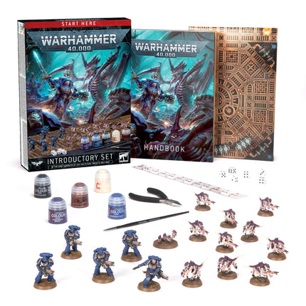 a box of warhammer miniatures and a game set