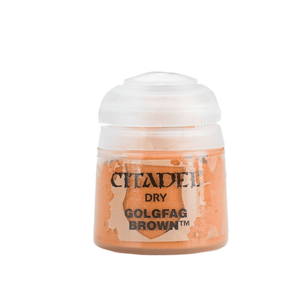 a bottle of orange colored paint on a white background