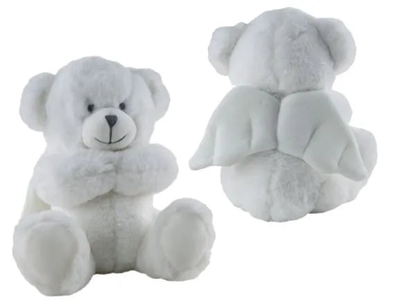 two white teddy bears sitting next to each other