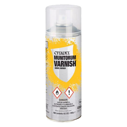 a spray of yellow paint on a white background